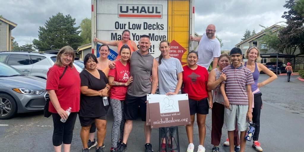 Volunteers gathered for a moving day event