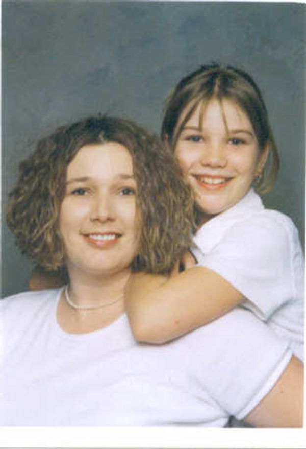 Mother and daughter smiling portrait