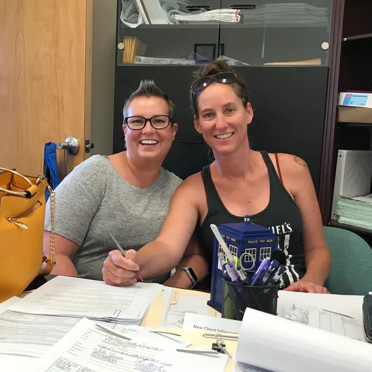 Happy pair in an office setting