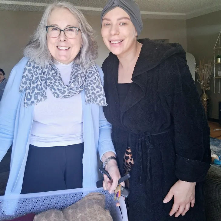 Happy women wearing scarves and robes