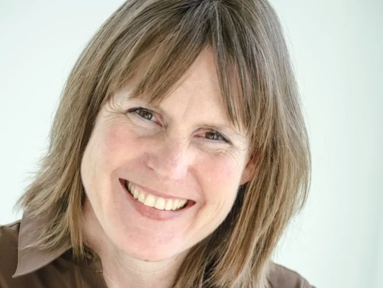 Close-up of woman smiling warmly