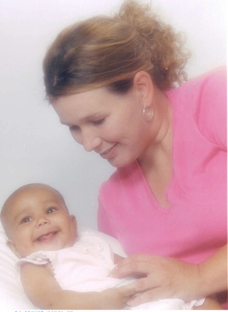Mother smiling at her baby
